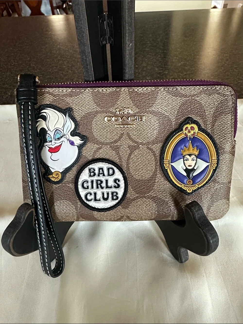 Coach Canvas Disney “Bad Girls Club”Wristlet in Brown with Purple Trim